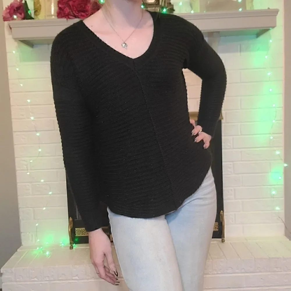 Black knitted sweater by Sam Edelman